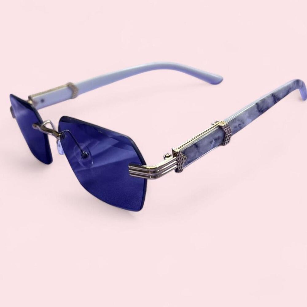 Black tinted rimless sunglasses with gold hardware and marble detail y2k glam